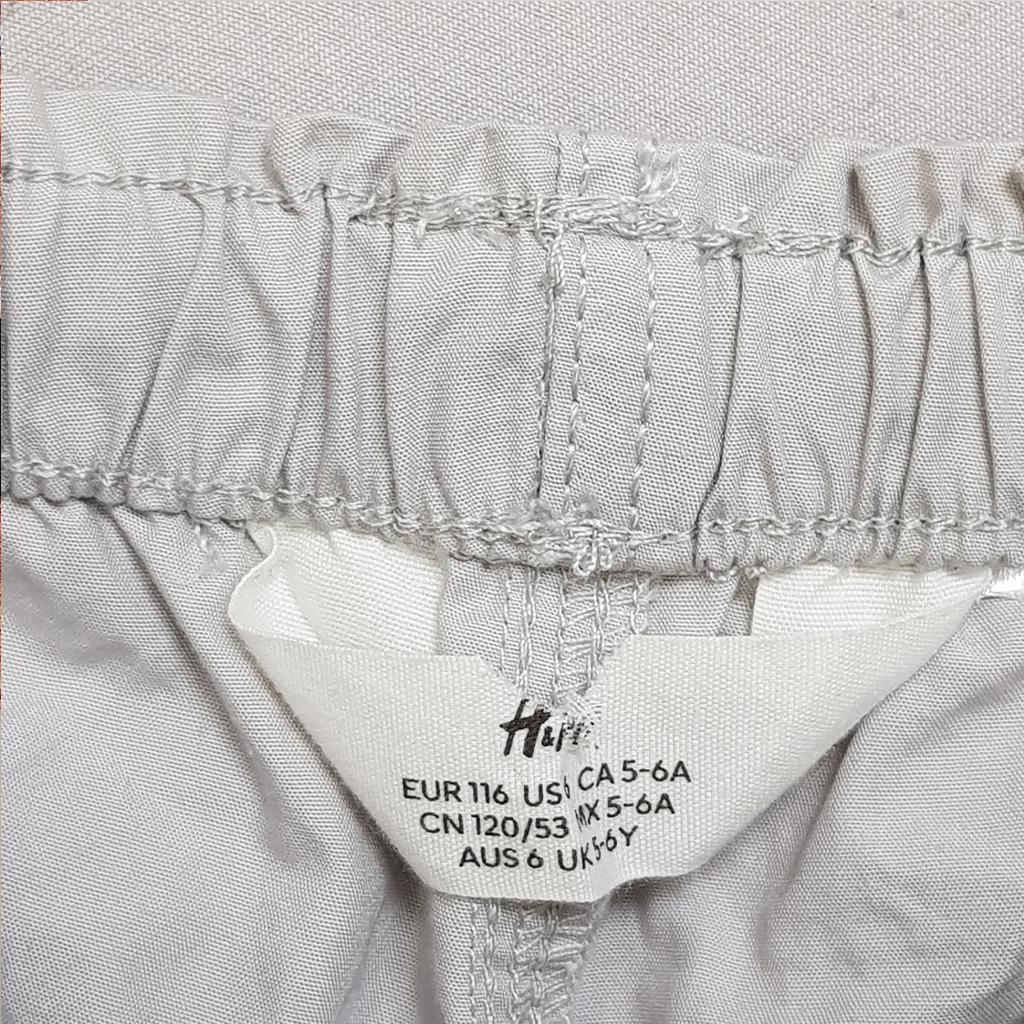 شلوار کتان دخترانه 30897 سایز 2 تا 12 سال کد 1 مارک H&M   *