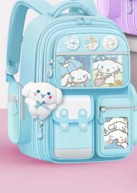 کوله مدارس همراه با آویز عروسکی کرومی کد 418019