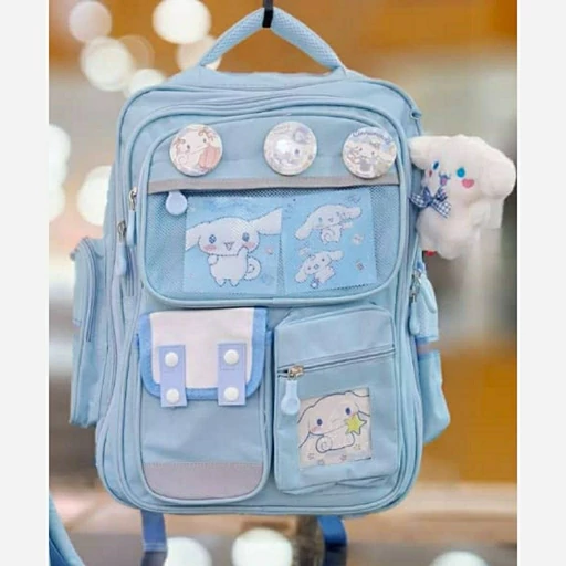 کوله مدارس همراه با آویز عروسکی کرومی کد 418019