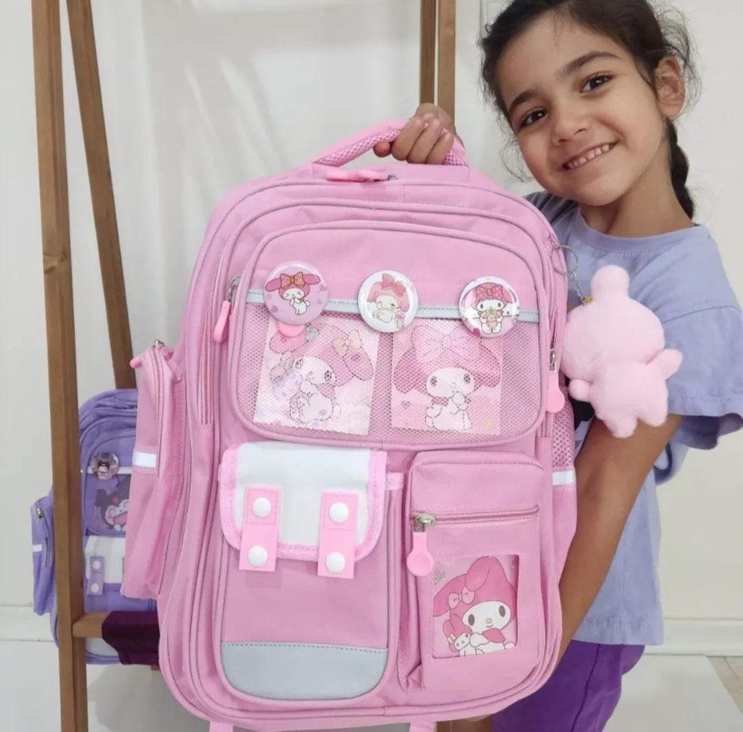 کوله مدارس همراه با آویز عروسکی کرومی کد 418019