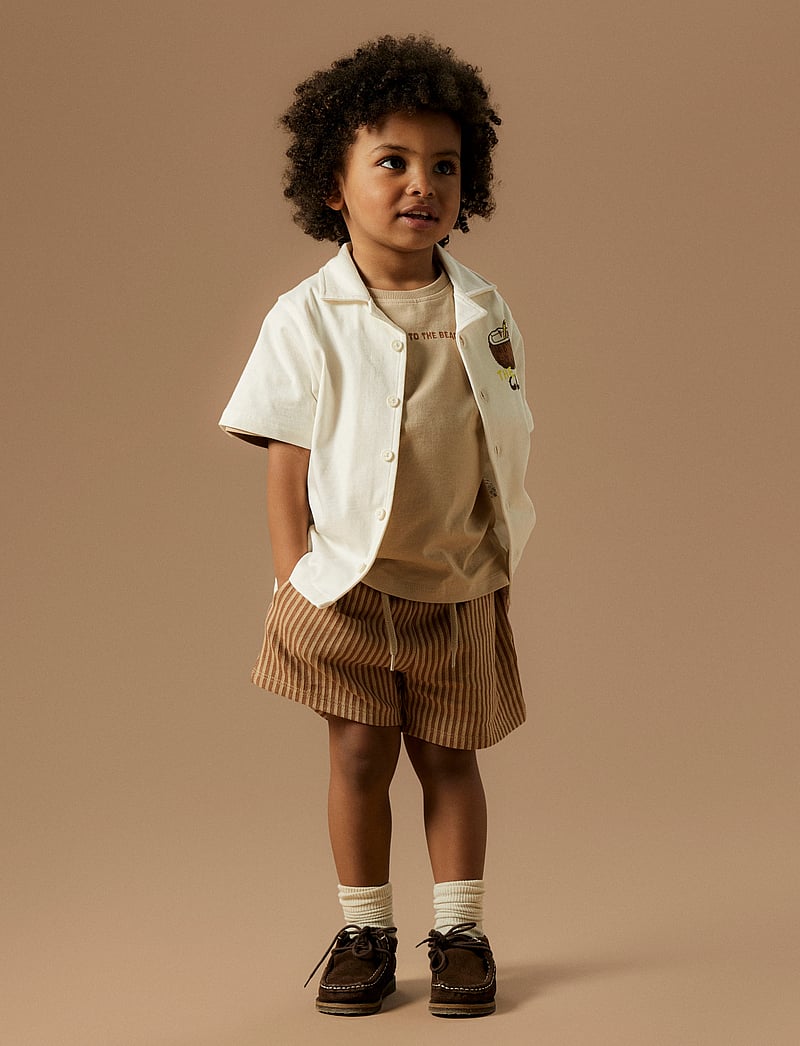 شلوارک پسرانه 30455 سایز 9 ماه تا 11 سال کد 1 مارک Name It